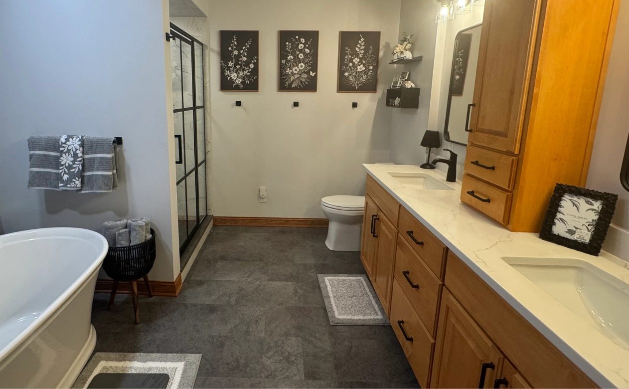 Bathroom with tile flooring and a walk in shower